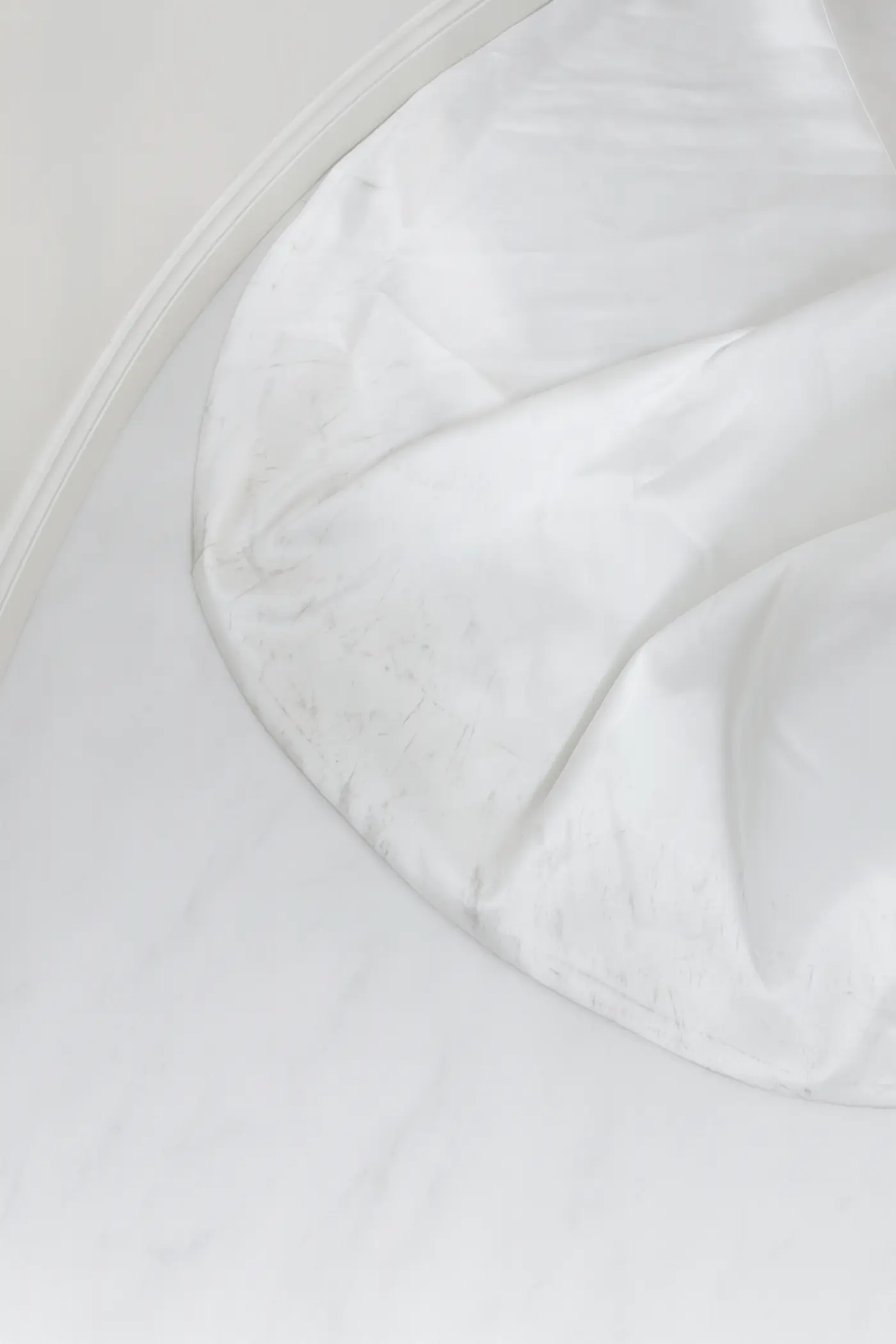 Wedding dress after cleaning, restored to bright white