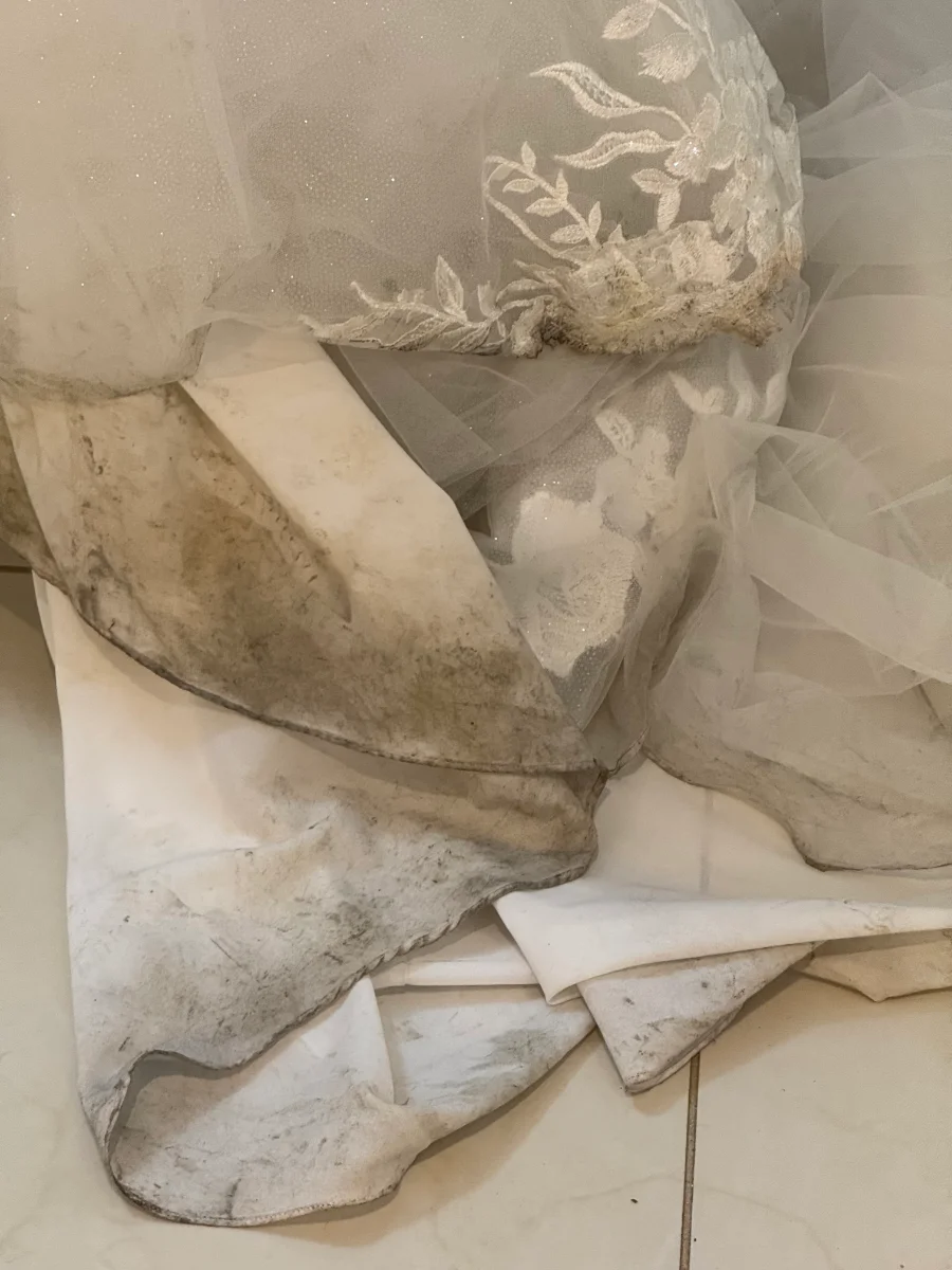 Wedding dress after cleaning, restored to bright white