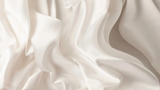 Close-up of bridal chiffon fabric showing lightweight translucent drape