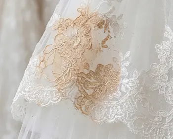 Foundation makeup stain on bridal gown neckline before oil-solvent pre-treatment