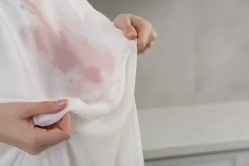Red Wine stain on a wedding gown